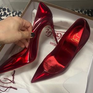 Christian Louboutin Kate Patent Pointed-Toe Red Sole High-Heel
Pumps. 120 mm.